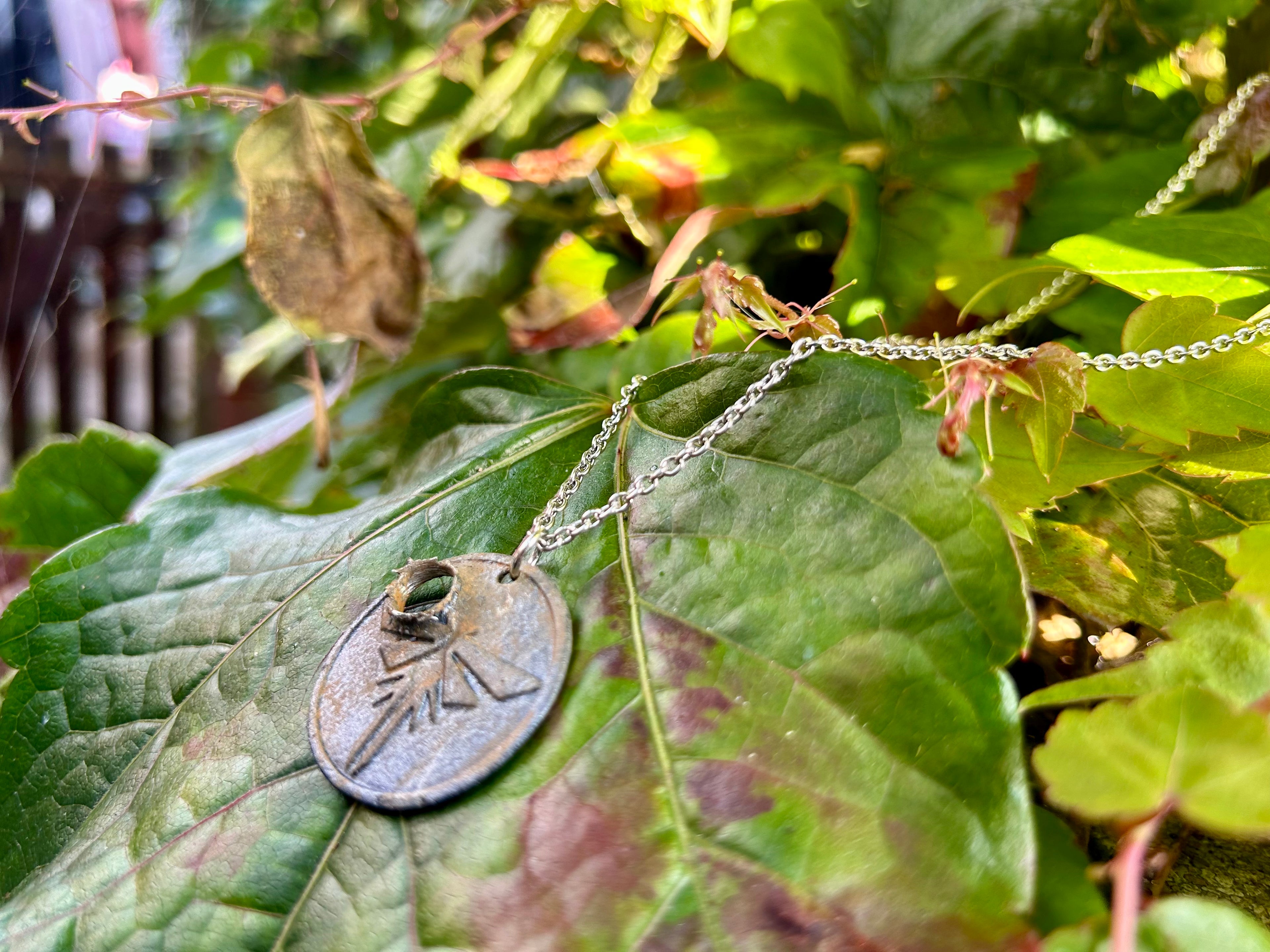 The Bullethole Pendant (Metal)