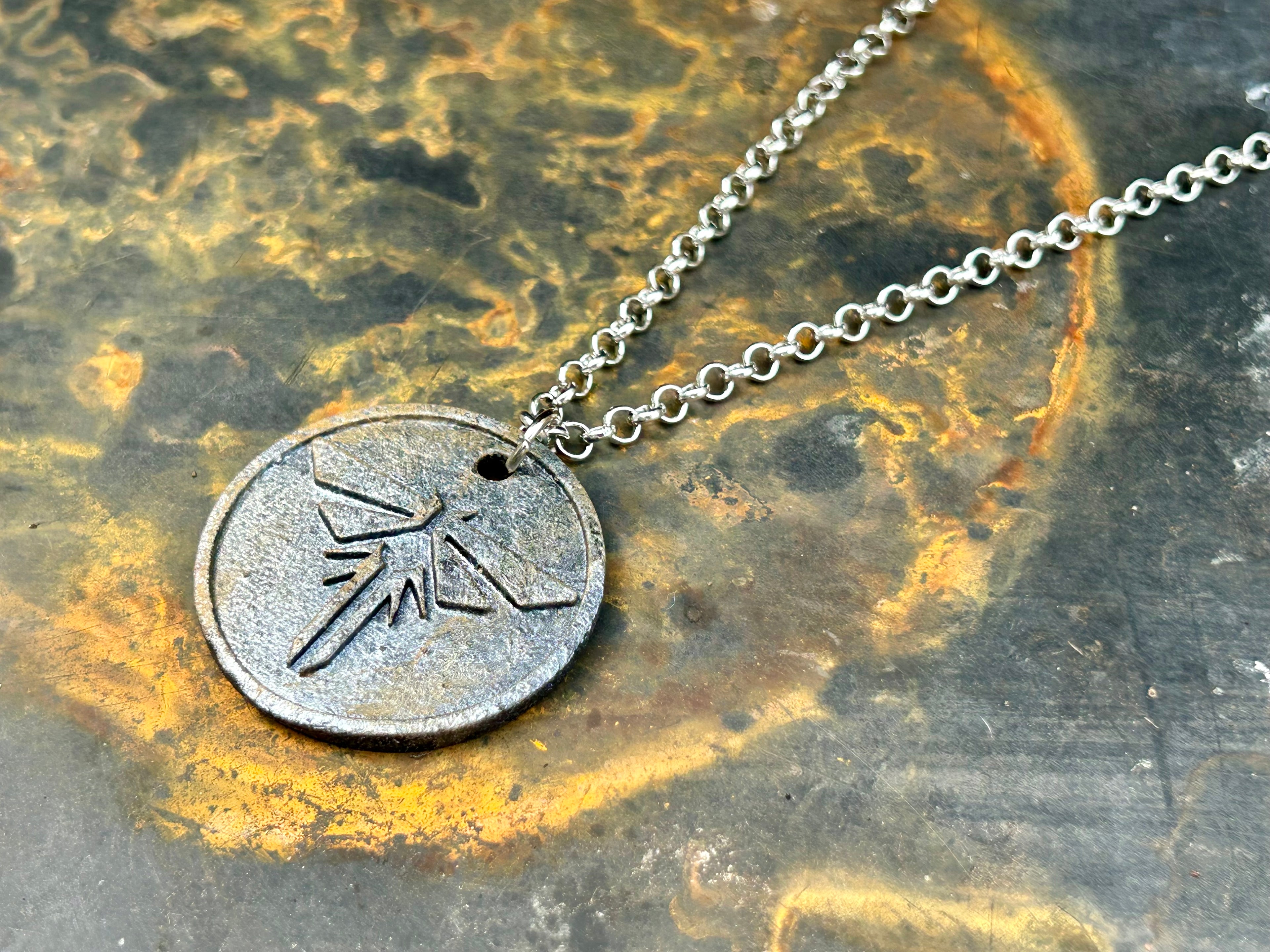 The Resistance Pendant (The Brother)