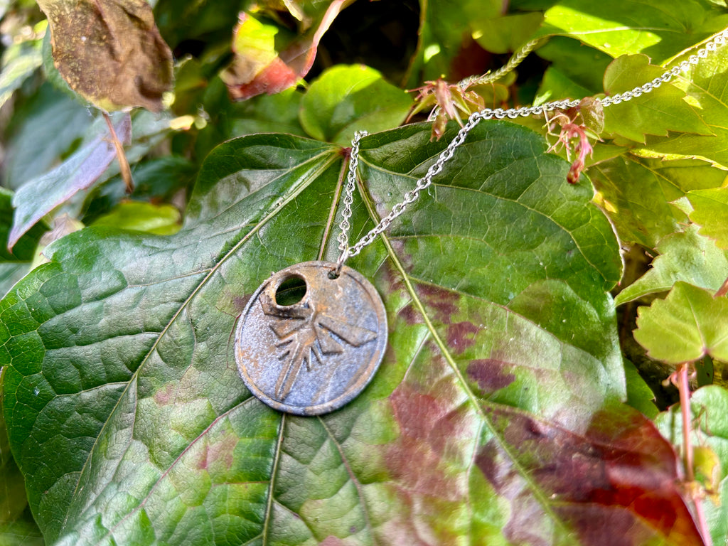 The Bullethole Pendant (Metal)