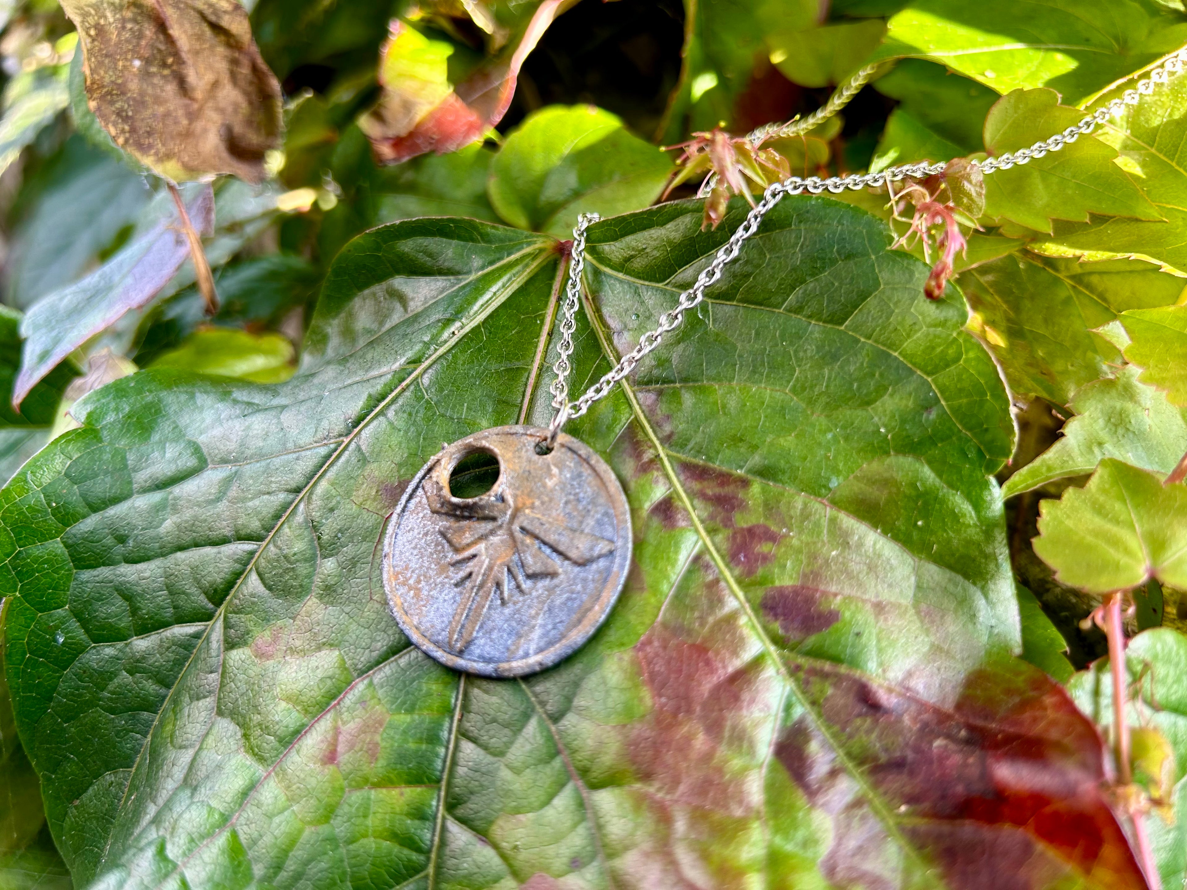The Bullethole Pendant (Metal)
