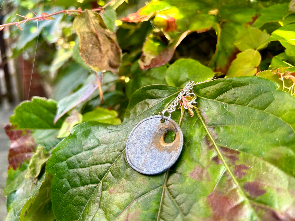 The Bullethole Pendant (Metal)